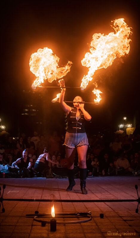 kaylie kreatrix fire double staff ottawa busker fest.jpeg