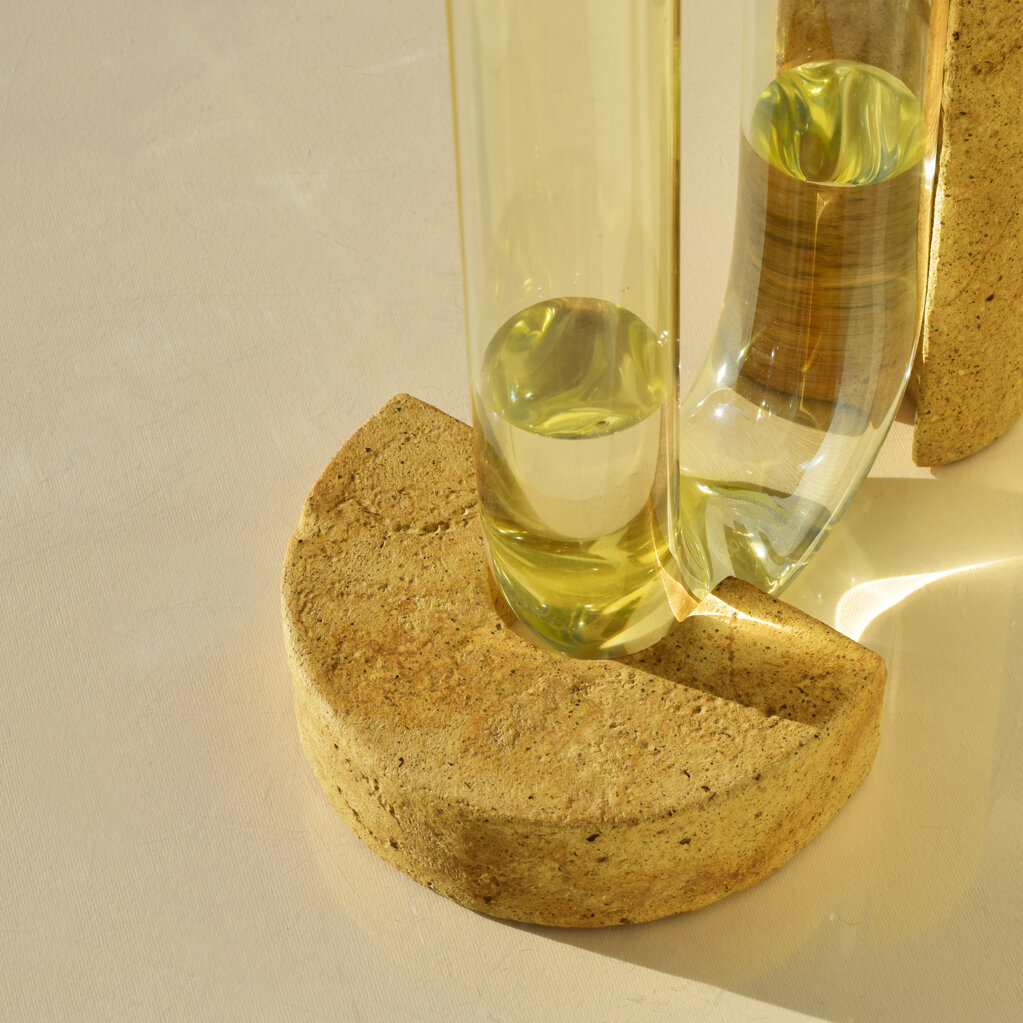 Detail of natural composite stone and glass, handcrafted in Italy under soft natural light