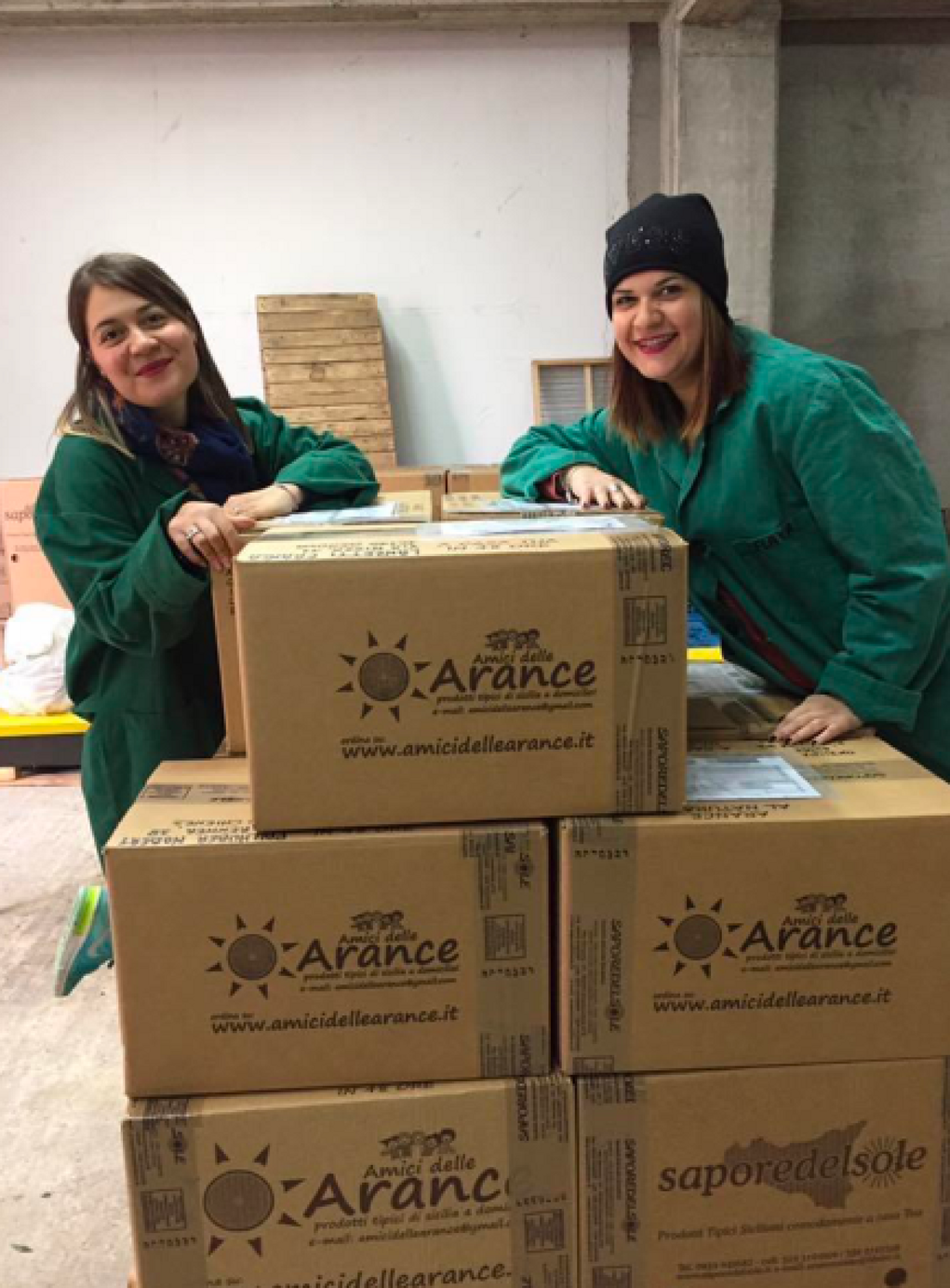 Organic farming in Catania with citrus produce by women in green uniforms