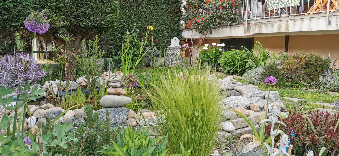 Giardino privato con biolago e fitodepurazione a Torino