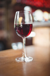 close-up-glass-with-red-wine-table.jpeg