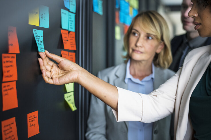 businesspeople-planning-tasks-with-sticky-notes.jpeg businesspeople-planning-tasks-with-sticky-notes.jpeg