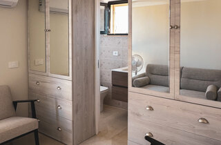 Bagno in suite con porta scorrevole a scomparsa Bagno in suite con porta scorrevole a scomparsa