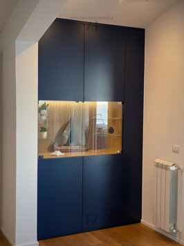 Finiture eleganti su arredo mansarda personalizzato