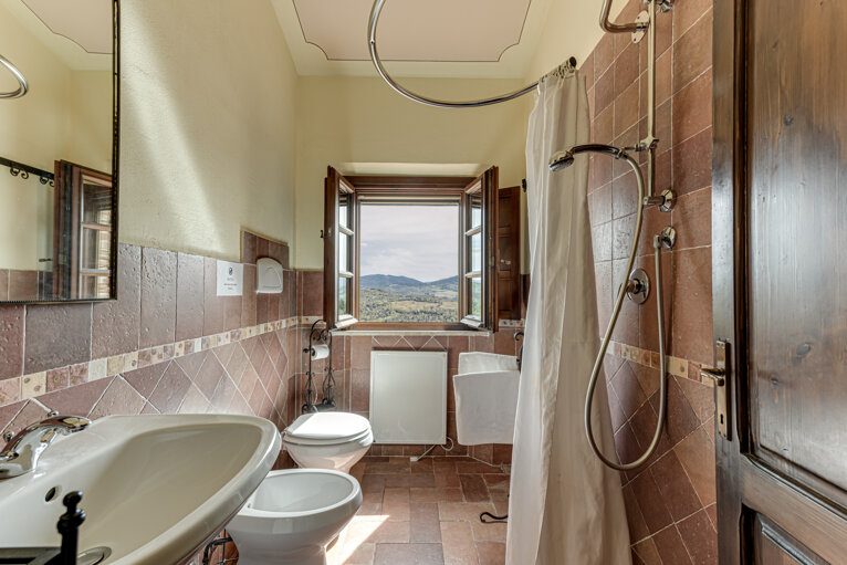 Modern private bathroom facilities preserving authenticity