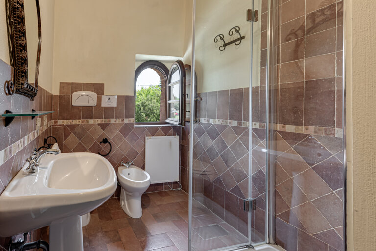 Modern private bathroom facilities preserving authenticity