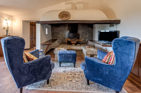 Historic wood fireplace for relax in Tuscany villa