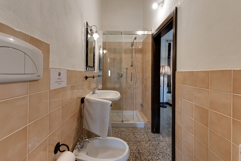 Modern private bathroom facilities preserving authenticity