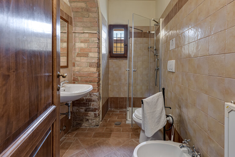 Modern private bathroom facilities preserving authenticity