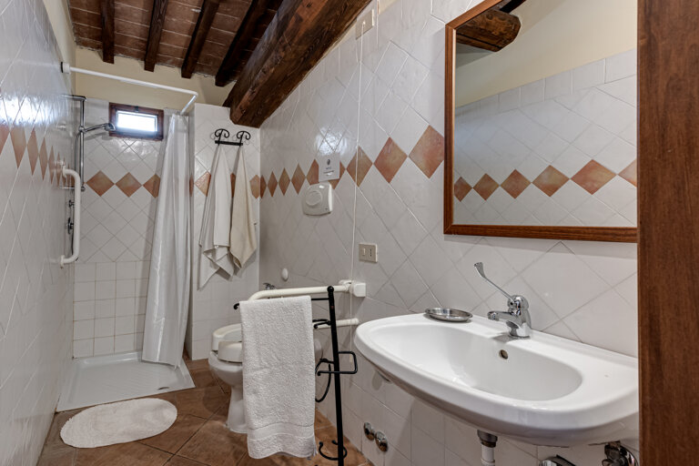 Modern private bathroom facilities preserving authenticity