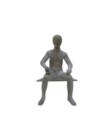 manichino-bambino-testa-uovo-cemento-s