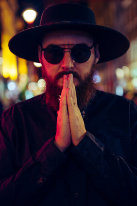 MURDAH SRVC musician portrait with neon lighting - mysterious artist persona inspired by manga culture