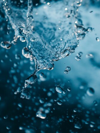 dynamic-water-splash-with-bubbles-refreshing-aquatic-background.jpeg