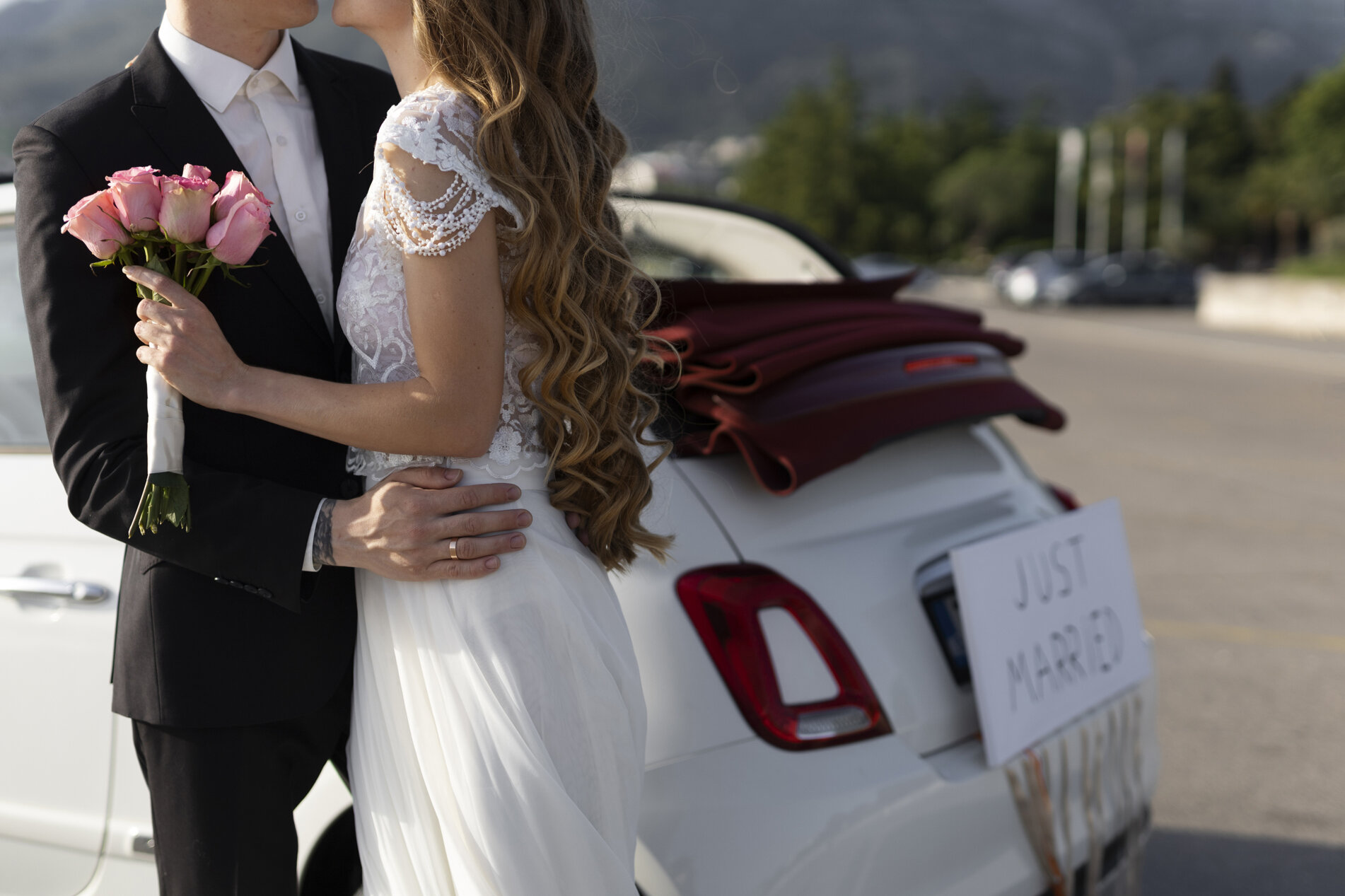 just-married-couple-little-car.jpeg