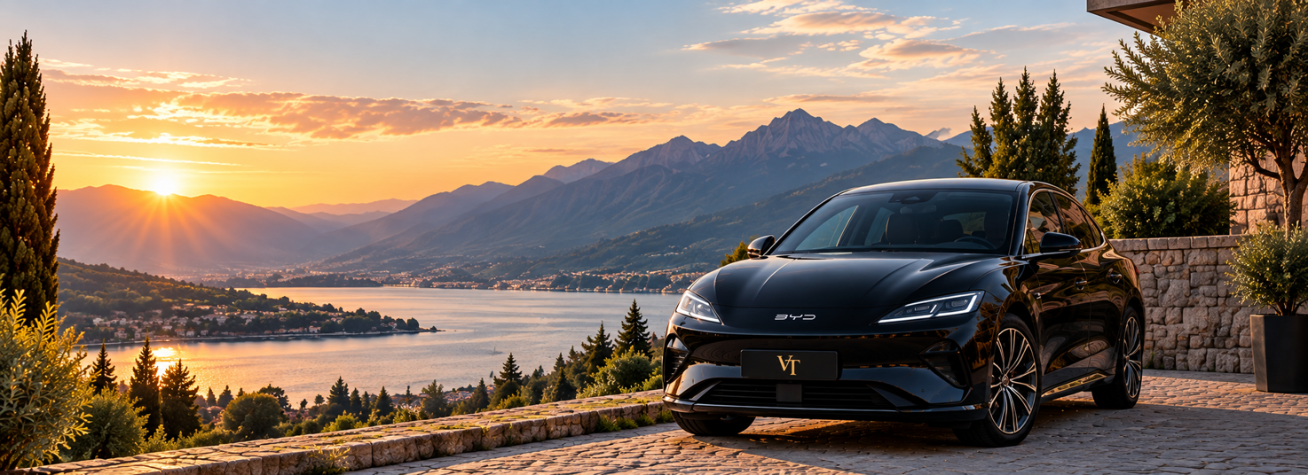 une byd seal noire via tourismo vt au coucher du soleil près d'un lac