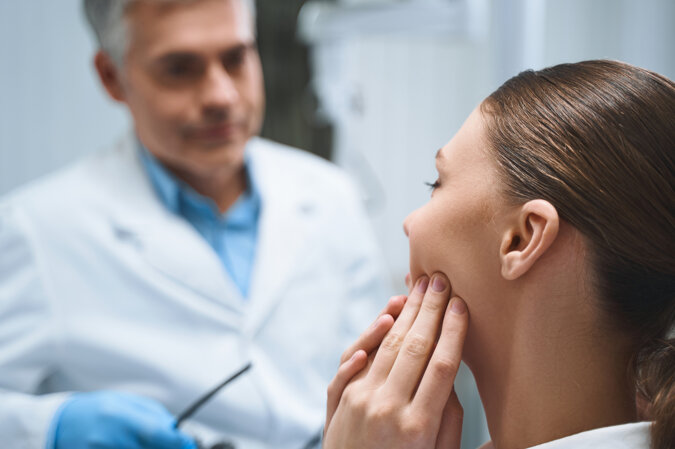 young-lady-is-sitting-dental-clinic-complaining-problems-mouth-expierenced-doctor.jpeg