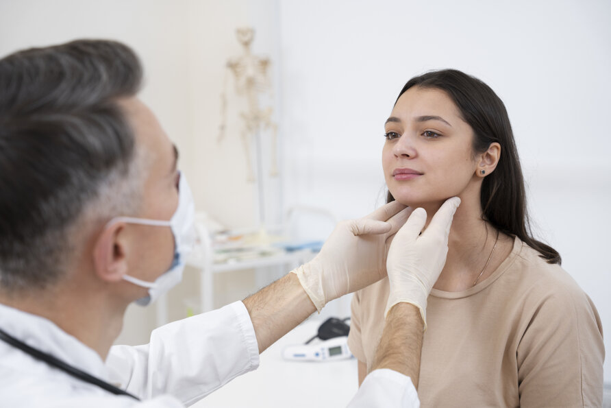 doctor-performing-routine-medical-checkup.jpeg