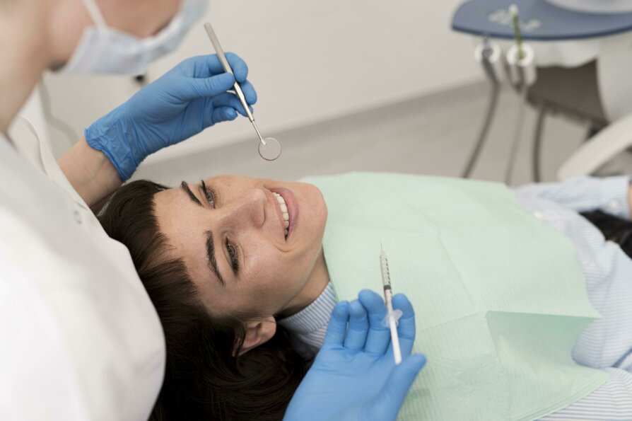 female-patient-having-procedure-done-dentist (1).jpeg