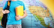 student-hand-with-books-map-learn-languages (1).jpeg
