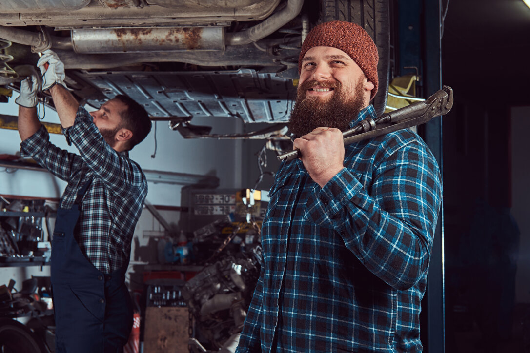 two-bearded-brutal-mechanics-repair-car-lift-garage-repairing-car-suspension-service-station.jpeg two-bearded-brutal-mechanics-repair-car-lift-garage-repairing-car-suspension-service-station.jpeg