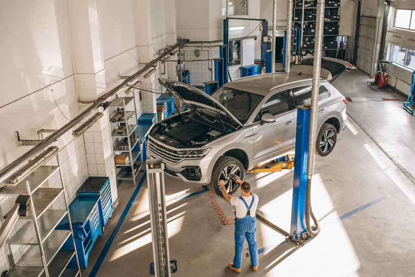 auto-mechanic-checking-car.jpeg