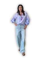 blusa-ricamata-con-nappine-tartaruga