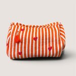 pochette-in-cotone-trapuntato-a-righe-arancio-con-cuoricini