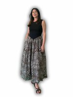 abito-lungo-con-top-nero-e-gonna-animalier-tensione-in