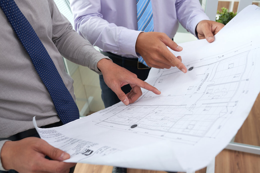 architects-discussing-construction-project.jpeg