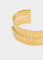 bracciale-rigido-con-dettaglio-centrale-oro