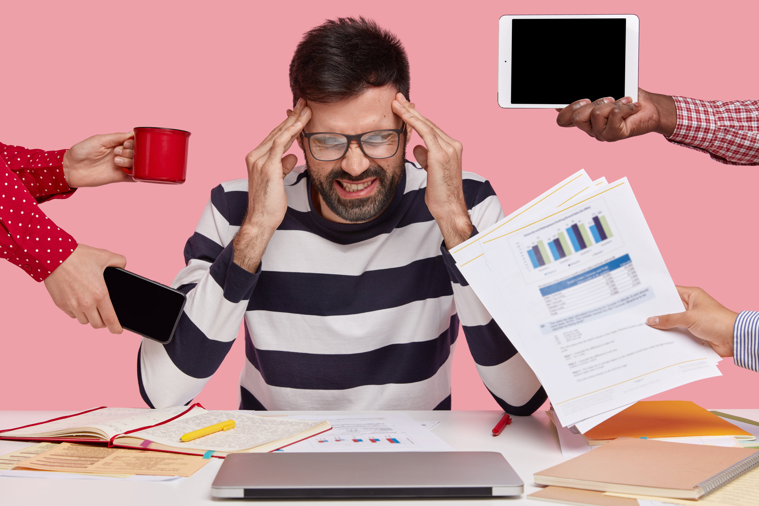 brunet-man-sitting-desk-surrounded-with-gadgets-papers.jpeg brunet-man-sitting-desk-surrounded-with-gadgets-papers.jpeg