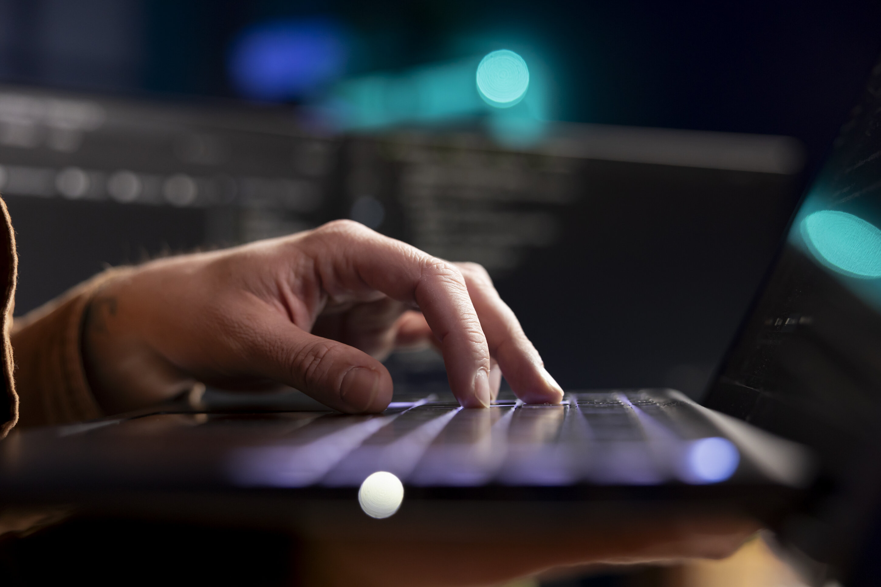 cybersecurity-expert-using-laptop-look-company-security-vulnerabilities.jpeg