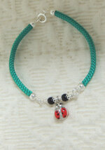 bracciale-con-su-coccu-e-coccinella