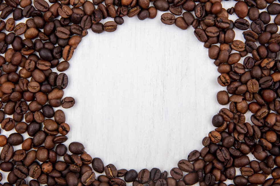 top-view-fresh-coffee-beans-isolated-white-background-with-copy-space.jpeg