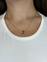 collana-cuore-vuoto-e-punto-luce-dorata