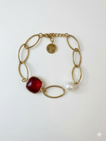 bracciale-in-acciaio-con-quarzo-rosso-e-perle-di-fiume