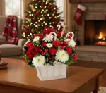 cesto-floreale-di-natale-con-candy-cane-rose-rosse-e-crisantemi-con-consegna-in-giornata-a-milano